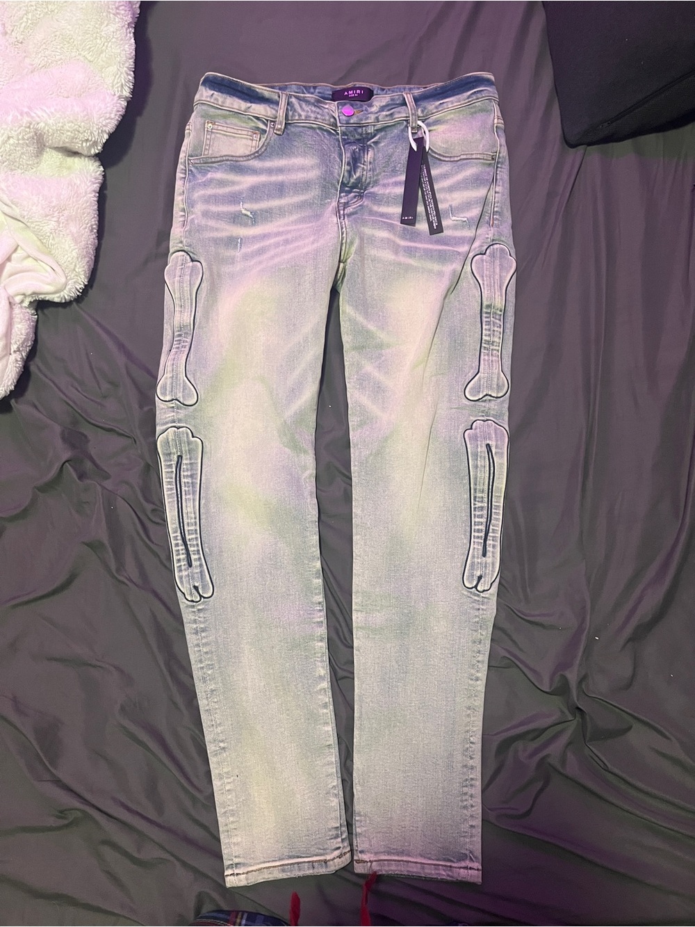 AMIRI Light Blue Skinny Jeans with Bone Appliqués